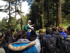 Deborah orients the students to the woods.