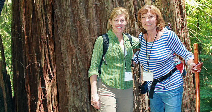 Tamara Pabis, left, and Joyce Harris enjoy a day in the redwood forest. Harris is helping to protect the future of our redwood forests by naming the League in her estate plan.