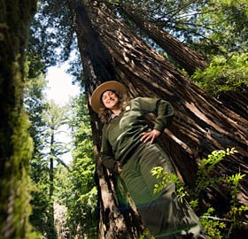 Mia Monroe, Site Supervisor at Muir Woods National Monument, has long collaborated with the League to share redwoods with the forest's 1.5 million annual visitors. Photo by Paolo Vescia