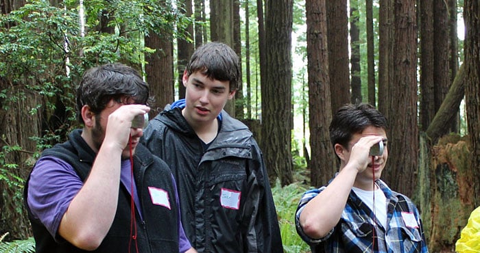 Arcata High School students measure tree height using a clinometer. Your support enabled them and others to explore forest stewardship careers. Photo by The Forest Foundation