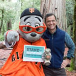 Giants mascot Lou Seal and League President Sam Hodder together at Big Basin Redwoods State Park. Photo by Mike Kahn, Save the Redwoods League