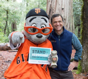 Giants mascot Lou Seal and League President Sam Hodder together at Big Basin Redwoods State Park. Photo by Mike Kahn, Save the Redwoods League