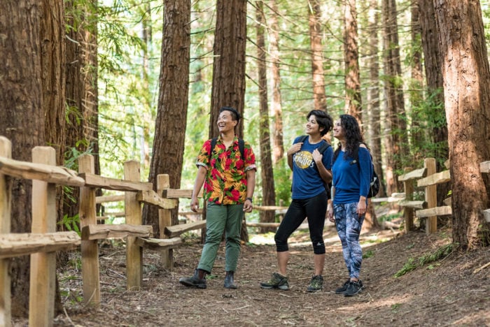 Amanda Machado (center) visits Redwood Regional Park in Oakland with friends