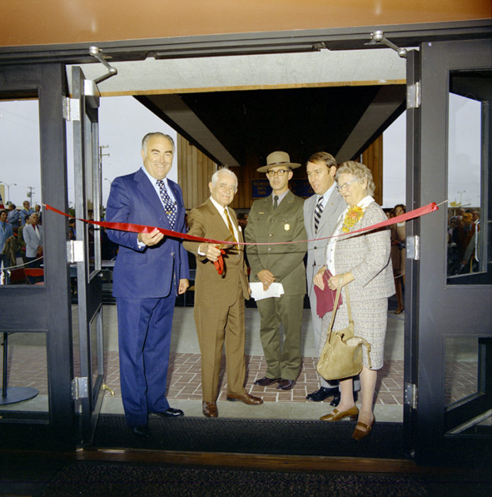 Dedication of Drury Visitor Center, Redwood National Park, October 20, 1973. [Rep. Don Clausen; Mr. Newton B. Drury; Mr. John Davis, Superintendent of Redwood National Park; Mr. Ronald Walker, Director of National Park Service; Mrs. Newton B. Drury.] Photo: David H. Swanlund [#4468]. Save the Redwoods League photograph collection [graphic], BANC PIC 2006.030- NEG, NEG box 9. Courtesy of The Bancroft Library, University of California, Berkeley.