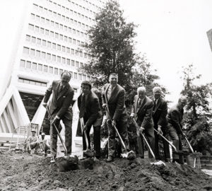 First tree planted in Transamerica Pyramid Redwood Park, June 12, 1973. [John Chase, VP Corporate Relations, Transamerica Corp.; Tony Guzzardo, Anthony M. Guzzardo & Assoc., Landscape Architect; John Dewitt, Secretary, Save the Redwoods League; Newton B. Drury, President, Save the Redwoods League; Leo Hewlett, President, California Redwood Association; Keith Lanning, Exec. VP, California Redwood Association.] Photo: Action Photo Service. Save the Redwoods League photograph collection [graphic], BANC PIC 2006.030--PIC, Carton 8. Courtesy of The Bancroft Library, University of California, Berkeley.