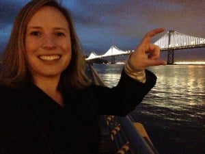 Emily Burns demonstrates that 1.5 tall coast redwoods are the same height as the Bay Bridge from water to tower top.