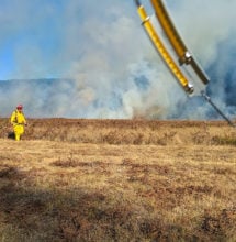 A sling psychrometer is used to measure temperature and relative humidity. Every hour, weather measurements are recorded and announced over the radio, allowing crews to anticipate fire behavior.