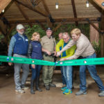 Representatives mark the grand opening of the ramada last year in Portola Redwoods State Park