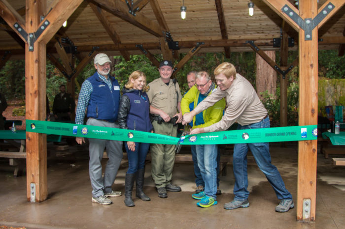 Representatives mark the grand opening of the ramada last year in Portola Redwoods State Park