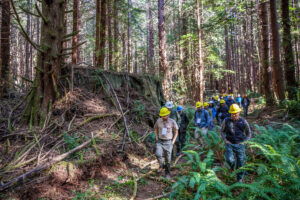 Save the Redwoods League, California State Parks, and National Park Service staff touring a Redwoods Rising restoration site in Redwood National and State Parks. Photo by Max Forster
