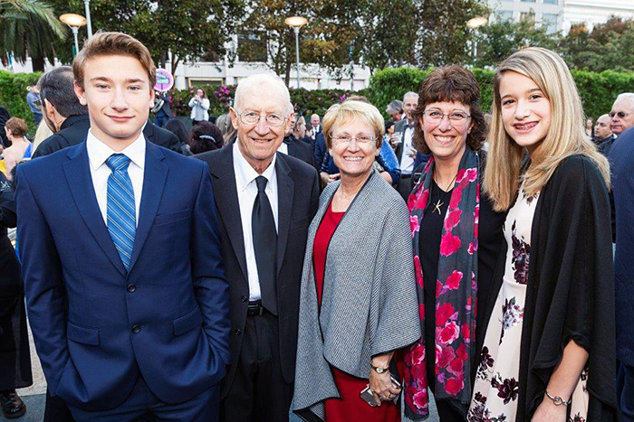 John and Cyndi Woollam (SECOND FROM LEFT AND CENTER), with their grandson Adam Rustermier (LEFT), daughter Cathy Rustermier, and granddaughter Ahna Rustermier