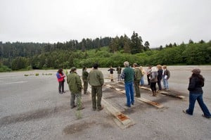 League and parks staff visit the former site of the Orick Mill, 45 acres of concrete with a lot of potential. Photo by Paolo Vescia