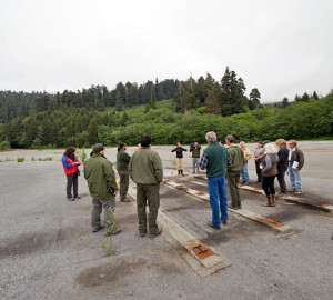 League and parks staff visit the former site of the Orick Mill, 45 acres of concrete with a lot of potential. Photo by Paolo Vescia