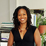 Majora Carter poses at her office Sep. 18, 2005 in New York. Photo by Zack Seckler, courtesy of John D. and Catherine T. MacArthur Foundation