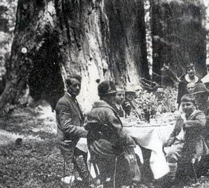 In 1926, John D. Rockefeller, Jr. discusses redwoods conservation with Save the Redwoods League leader Newton Drury. David Rockefeller is pictured on the front, right side.