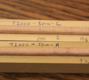 Tree ring cores are collected from multiple locations in redwood trunks to quantify tree size, age, growth history, and physiological response to past climates.