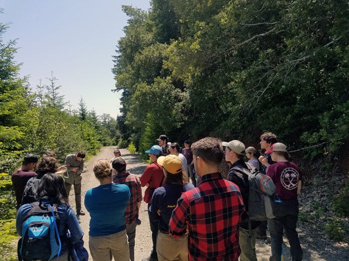 Apprentices and leads on a field tour of the Greater Mill Creek project area as part of their orientation. Photo by Tarah Burley