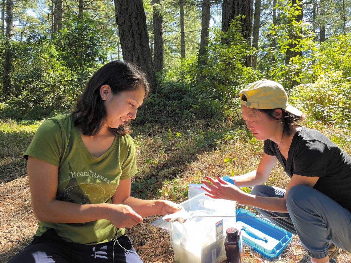 Two female scientists in the field